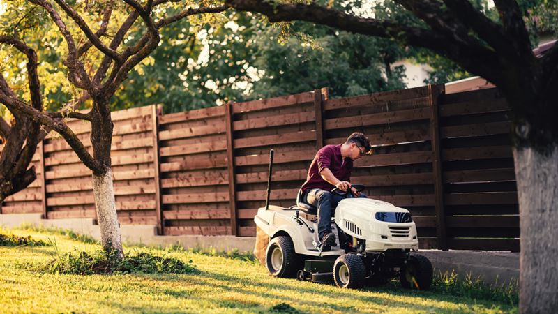 Comprehensive Guide to Enhancing Lawn Maintenance with Tractors