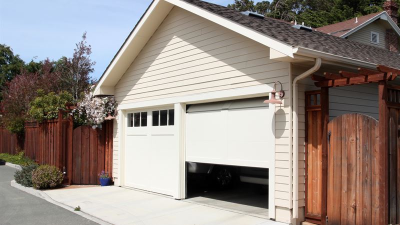 Essential Insights into Choosing and Maintaining Residential Garage Doors