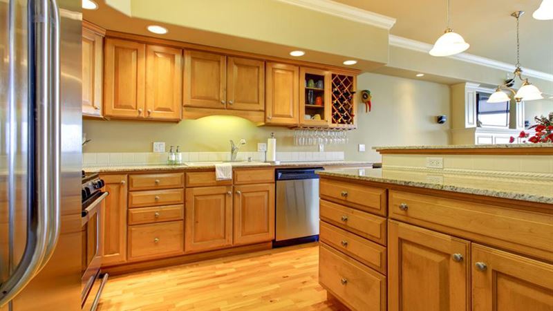 Essential Guide to Refreshing Your Kitchen Cabinets with Professional Painting Tips