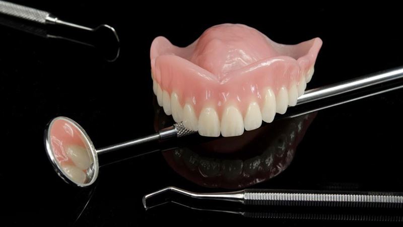Comprehensive Guide to Dentures: Benefits and Challenges